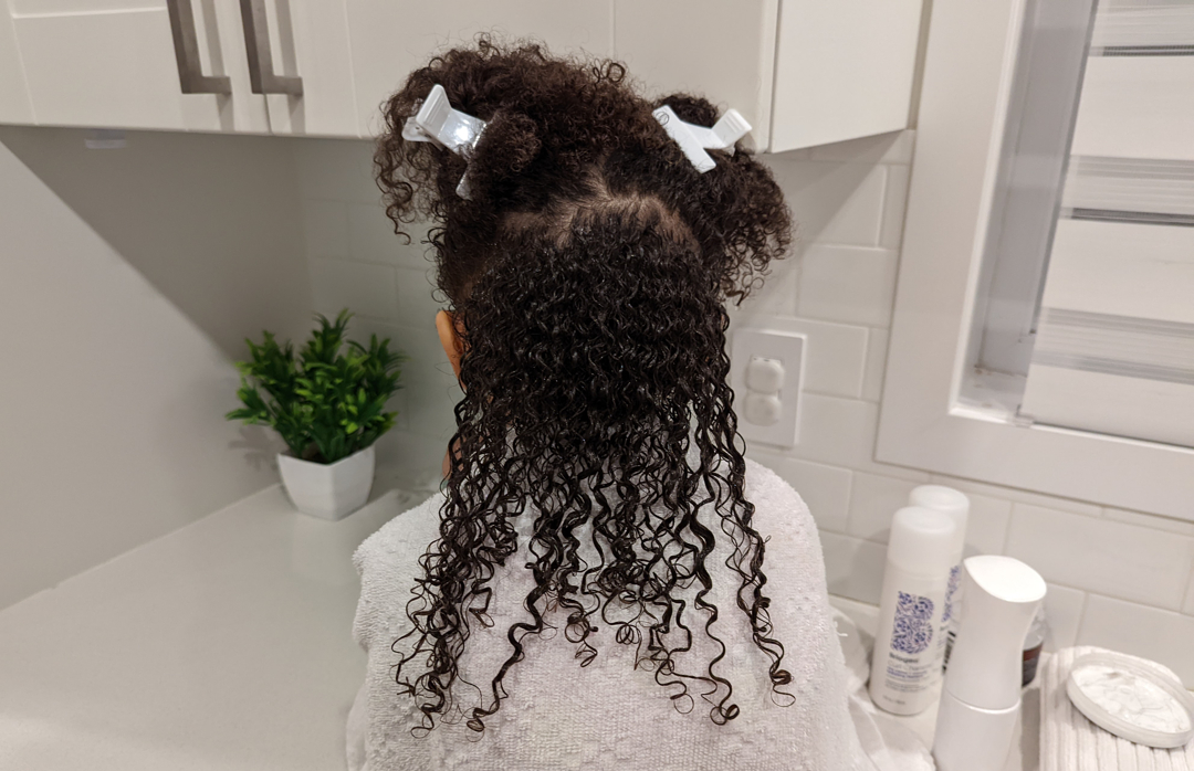 Eliana's biracial hair after TGIN Twist and Define Cream was applied.